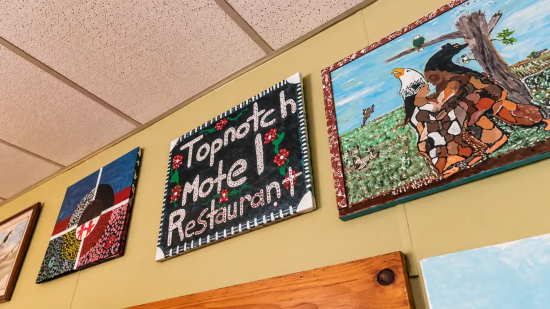 Handmade Top Notch Motel Restaurant sign and local artwork